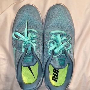 Brand New never worn Nike Free Runs. In perfect condition.